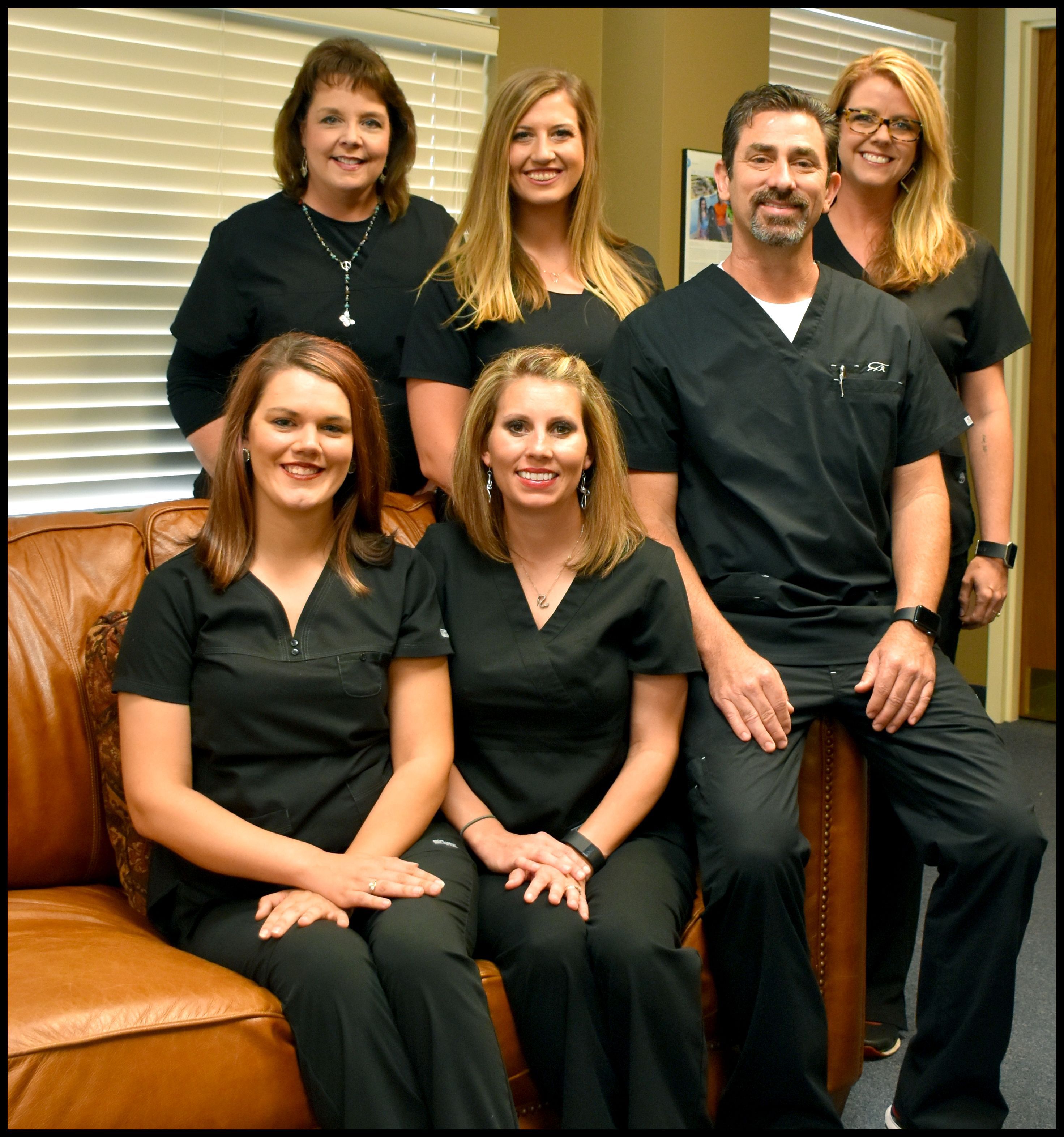image of Dr. Ray and his staff